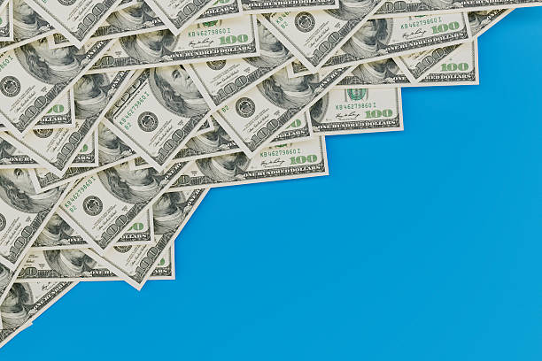istock US dollars banknotes, one hundred dollar bills 2229863345