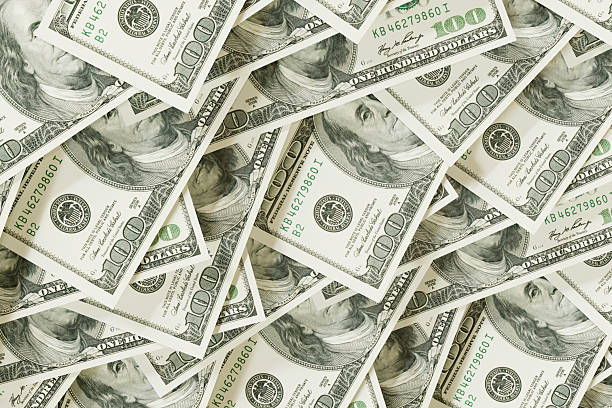 istock US dollars banknotes, one hundred dollar bills 2229863480