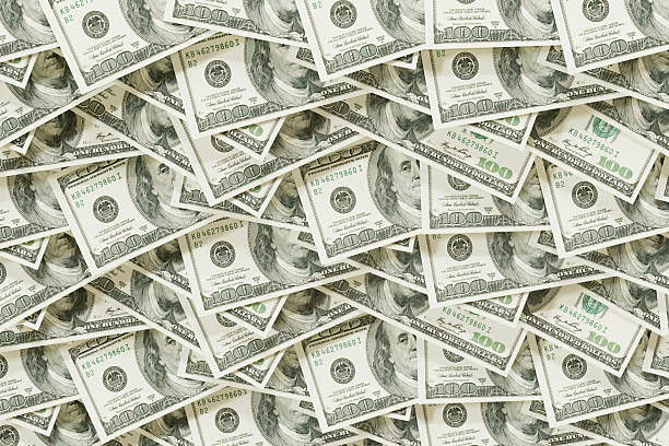 istock US dollars banknotes, one hundred dollar bills 2229863564