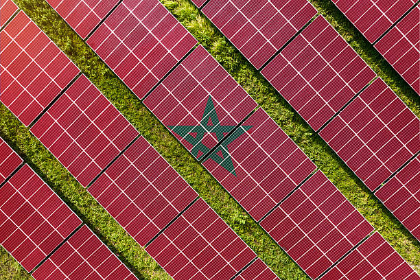istock Solar farm superimposed with flag of Morocco. Symbolizing solar power and panel demand, renewable energy industry, government policy, and sustainability initiatives in the country. 2229865936