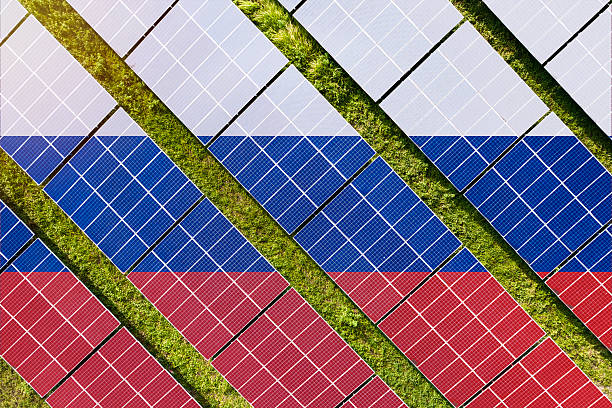 istock Solar farm superimposed with flag of Russia. Symbolizing solar power and panel demand, renewable energy industry, government policy, and sustainability initiatives in the country. 2229866256