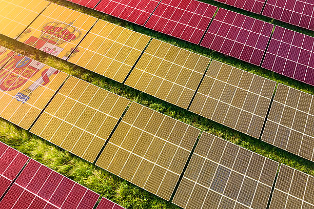 istock Solar farm superimposed with flag of Spain. Symbolizing solar power and panel demand, renewable energy industry, government policy, and sustainability initiatives in the country. 2229866541
