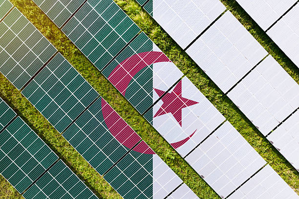istock Solar farm superimposed with flag of Algeria. Symbolizing solar power and panel demand, renewable energy industry, government policy, and sustainability initiatives in the country. 2229867453