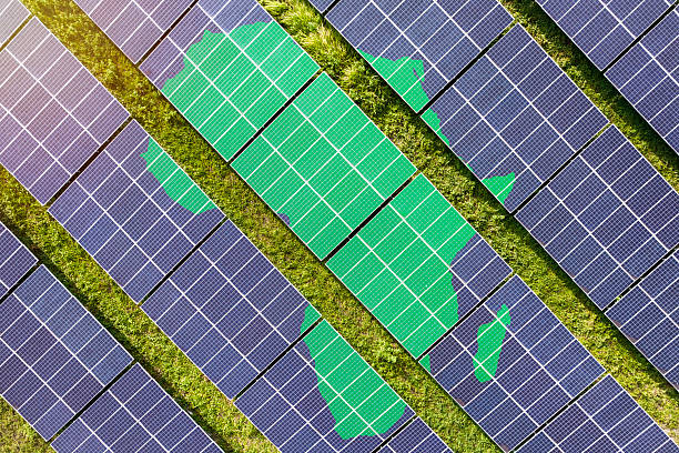 istock Solar farm superimposed with map of Africa. Symbolizing solar power and panel demand, renewable energy industry, government policy, and sustainability initiatives in the continent. 2229867457