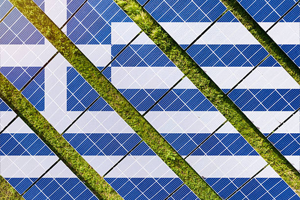 istock Solar farm superimposed with flag of Greece. Symbolizing solar power and panel demand, renewable energy industry, government policy, and sustainability initiatives in the country. 2229869053
