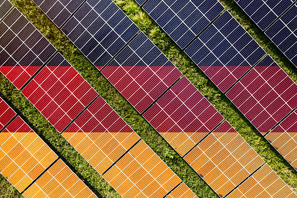 istock Solar farm superimposed with flag of Germany. Symbolizing solar power and panel demand, renewable energy industry, government policy, and sustainability initiatives in the country. 2229869056