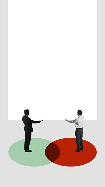 istock Collage-style two businessmen holding up blank space with calm expression 2229870338