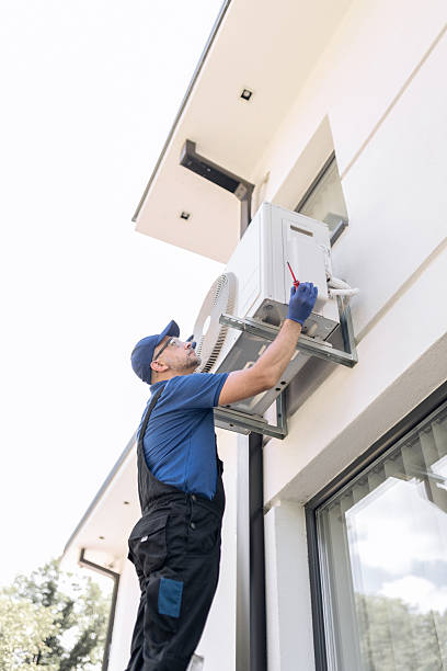 istock Repairman fixing AC outdoor unit. 2229873214
