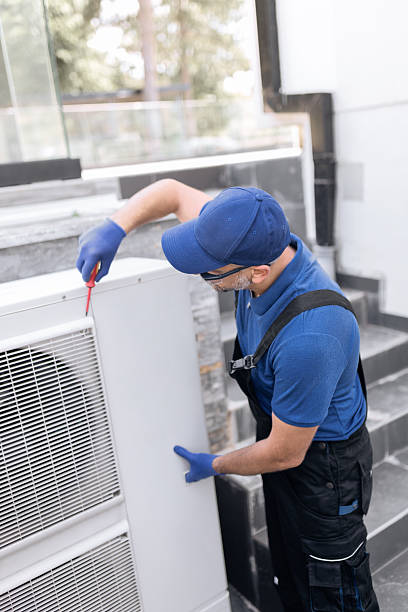 istock Repairman fixing AC outdoor unit. 2229873273