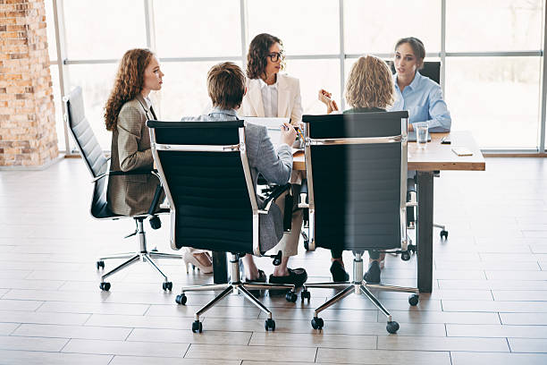 istock Diverse team having a business meeting in a modern office environment 2229875324