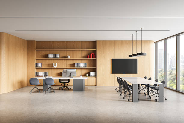 istock Modern executive office interior with meeting area, wooden wall panels, large windows, and minimalist furniture in elegant workspace design concept. 3D Rendering 2229882382