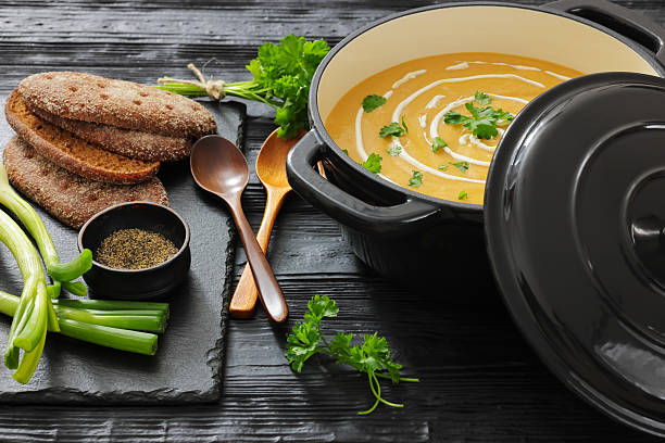 istock roasted parsnip and carrot soup, top view 2229885434