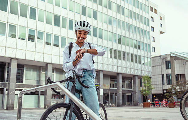 istock Young Multiracial Female Commuter Checking Time on Smartwatch 2229897032