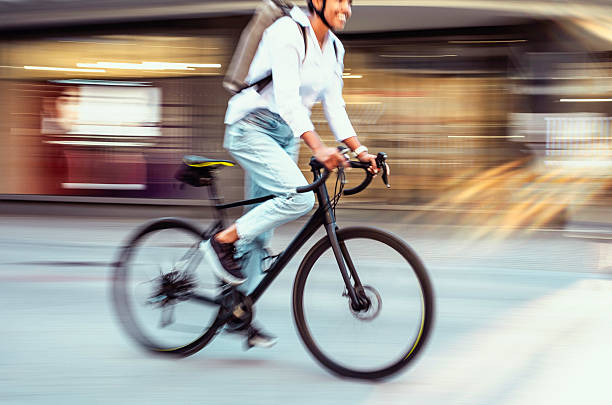 istock Young Multiracial Female Cycling With Backpack in City Setting 2229897064