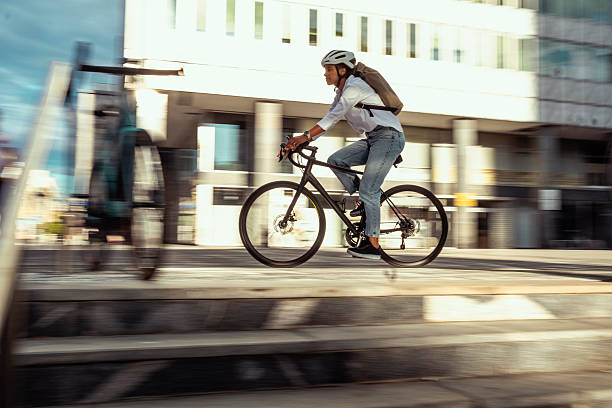 istock Young Multiracial Female Commuting to Work by Bicycle 2229897067