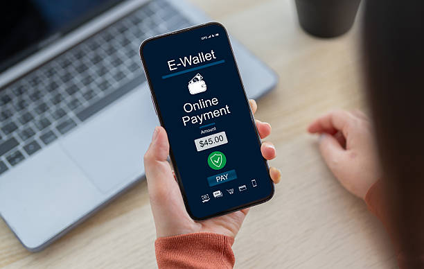 istock Online payment with e-wallet on smartphone screen, digital finance technology for shopping, mobile transfer with fintech application, e-commerce, mobile banking, digital wallet and cashless lifestyle 2229898398
