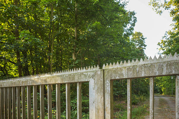 Concrete wall decays and exposes the rusting steel beams below. Concrete element crumbles_1