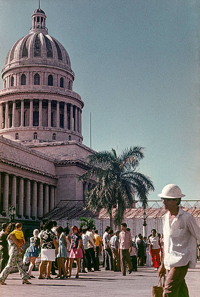 Havana, Cuba - December 1, 1976: human queue at El Capitolio, where is Exhibition of Achievements of Soviet science and technology