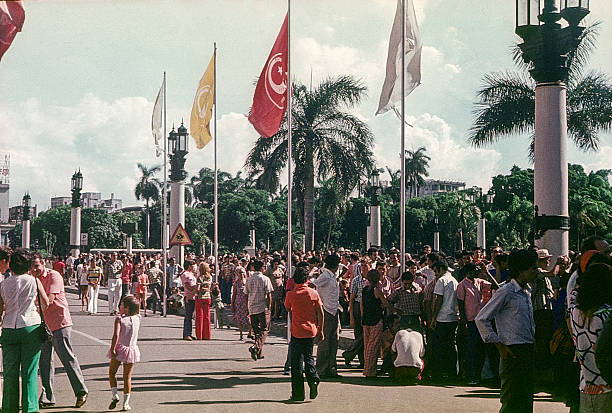Havana, Cuba - December 1, 1976: human queue at El Capitolio, where is Exhibition of Achievements of Soviet science and technology
