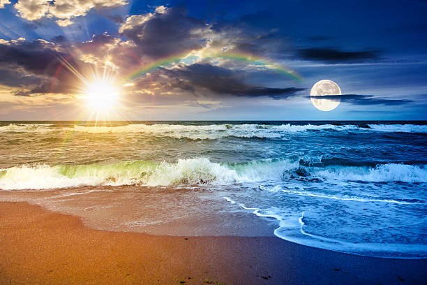 istock stormy beach scenery with waves splash on sand shore under scenic clouds on the sky 2229914064