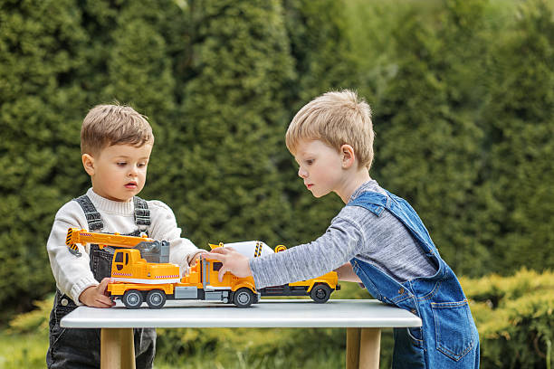 Playing time with toy truck stock photo