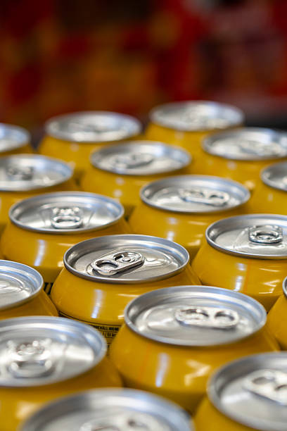 istock Rows of Golden Beverage Cans Packed Together 2229916494