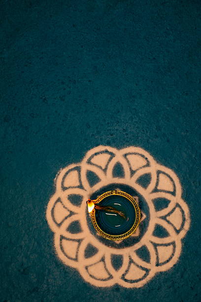 Oil lamp Diya burn during Diwali celebration. Festival of lights.