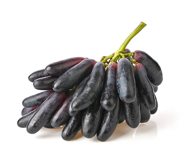Sweet black sapphire grapes. Purple Witch Finger grapes , Moon Drops grape or Witch Fingers isolated on a white background. hpoto from camera