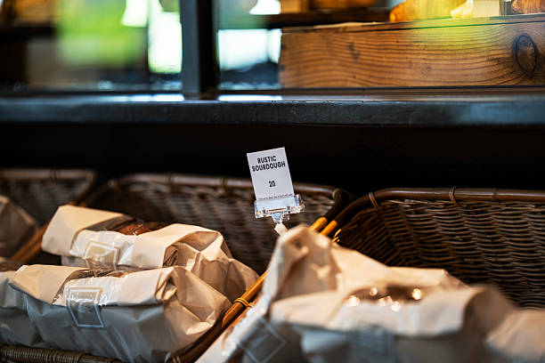 istock Rustic Sourdough Loaf in Paper Bag for Sale 2229922764