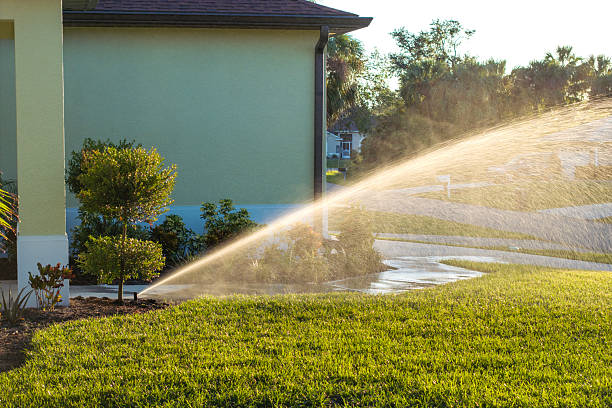 istock Automatic irrigation system with water sprinkler for maintaining grass lawn 2229925272