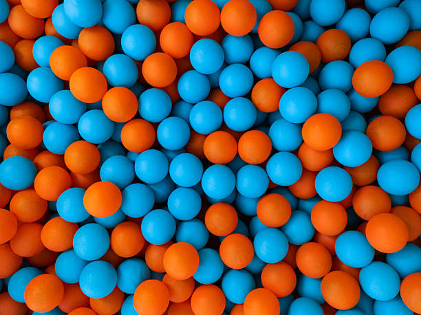 istock Blue and orange ball background 2229929664