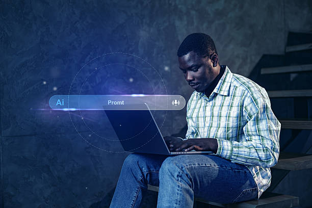 istock Man working on a laptop in a dimly lit space during an evening study session focused on artificial intelligence 2229930632
