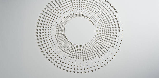 istock Intricate white circular paper cutout pattern with subtle shadows and radial symmetry 2229946171