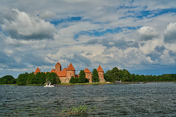 Scenic Lithuanian famous Trakai castle aerial view and islands in overcast day in summer.Historical travel destination in baltics