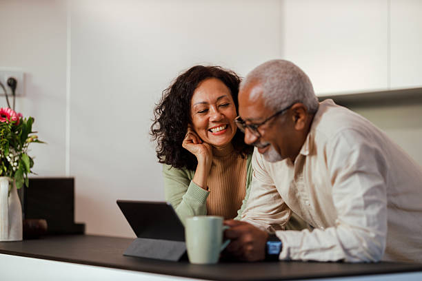 istock Happy Senior Couple Using Digital Tablet at Home 2229948065