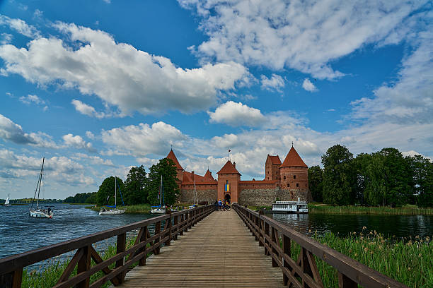 trakai, lithuania - 06 28 2023: Trakai Island castle, a brick building, one of the most popular touristic destinations in Lithuania, situated on a small island in lake Galve.