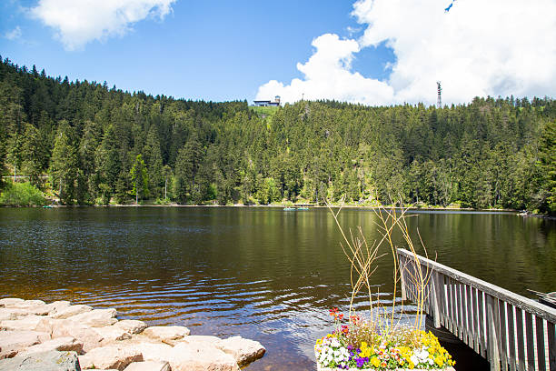 Mummelsee in the Black Forest. In the background is the Hornisgrinde mountain, at 1,164 m the highest peak in the Northern Black Forest.