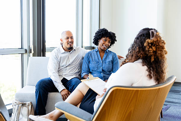 istock Couple in therapy session with a counselor 2229949507