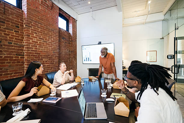 istock Team lunch meeting in the boardroom 2229952664