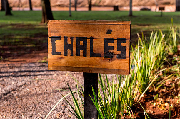 Sign written in Portuguese: Chalets