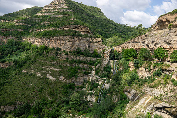 istock A mountain with a waterfall and a green valley 2229958647