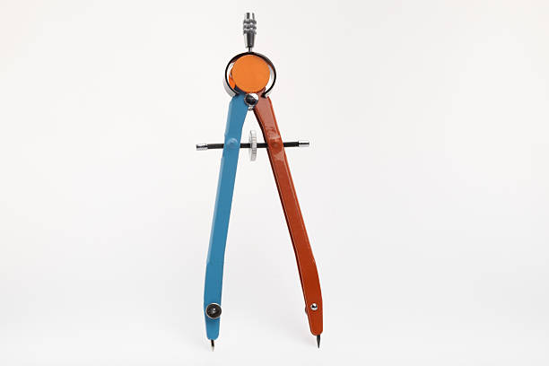 istock a drawing instrument used for drawing circles or arcs, and for measuring distances, especially on maps. 2229960516