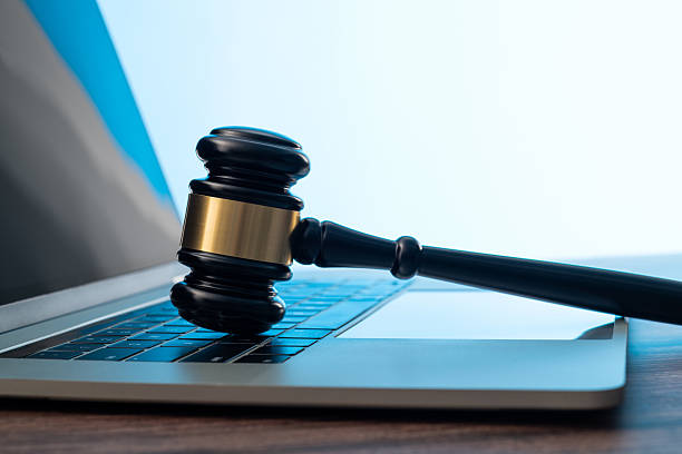 istock Gavel and laptop on the table 2229969709