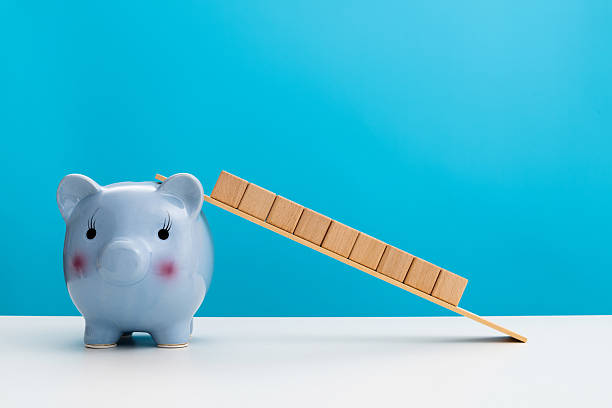 istock Piggy bank with blank blocks 2229970350