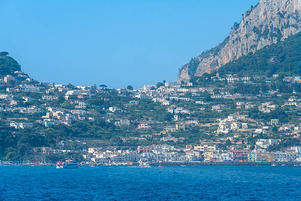 Capri, Campania, Italy - October 7, 2024: Capri, the port of Marina Grande. The island in the Gulf of Naples is famous for its rugged terrain, exclusive hotels, and shopping, ranging from high fashion to limoncello to handcrafted leather sandals.