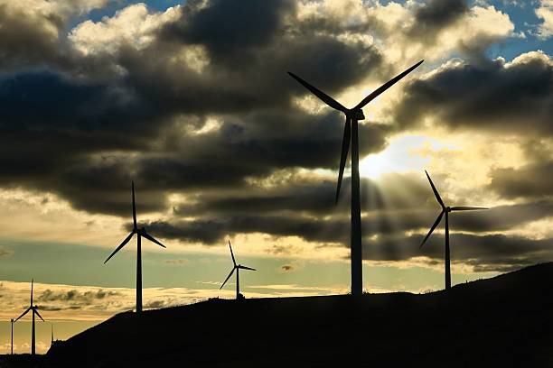 istock Wind Farm Turbines Silhouette 2229978840