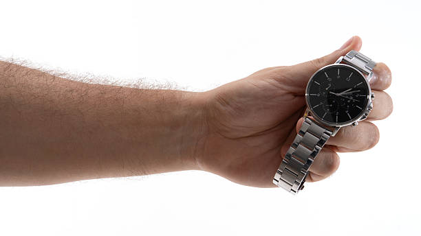 istock Showing a stylish silver watch held in hand with focus on details in a bright setting 2229981609