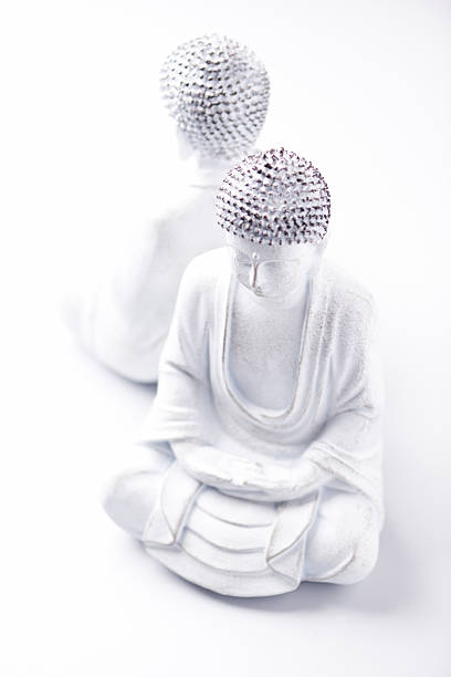 istock Meditating Buddha Statue on bright background. Soft focus. Copy space. 2229985731