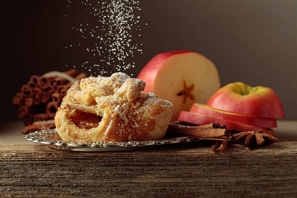 istock Viennese strudel with apple and cinnamon on old wooden table. 2229986730