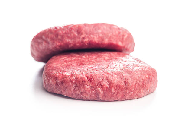 istock Raw burger beef patties isolated on white background. 2229987300